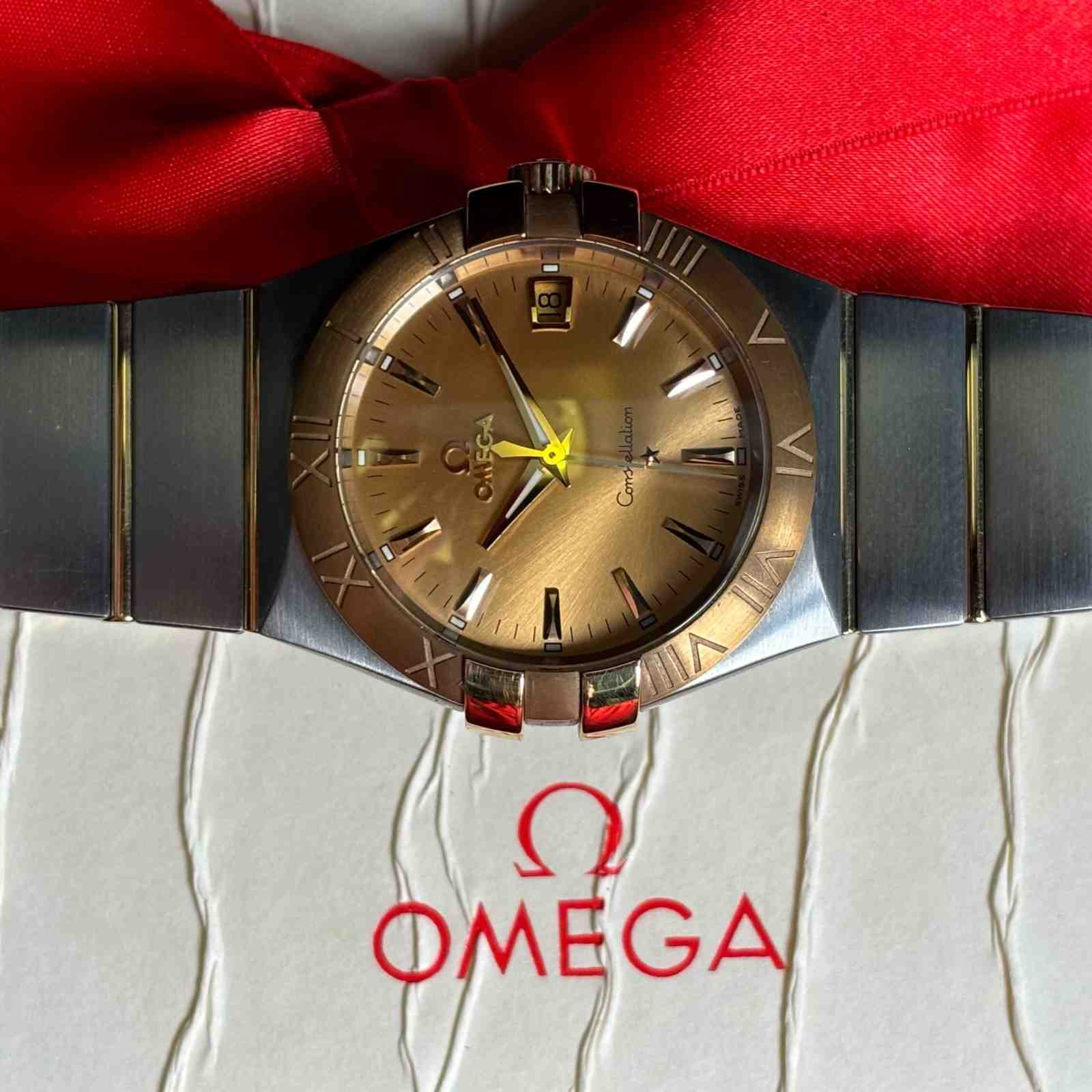 ساعت مچی مردانه امگا 35 میلیمتری تمام میخ طلا آکبند Omega Constellation مدل k-123.20.35.60.08.002-91068446 - تصویر 4