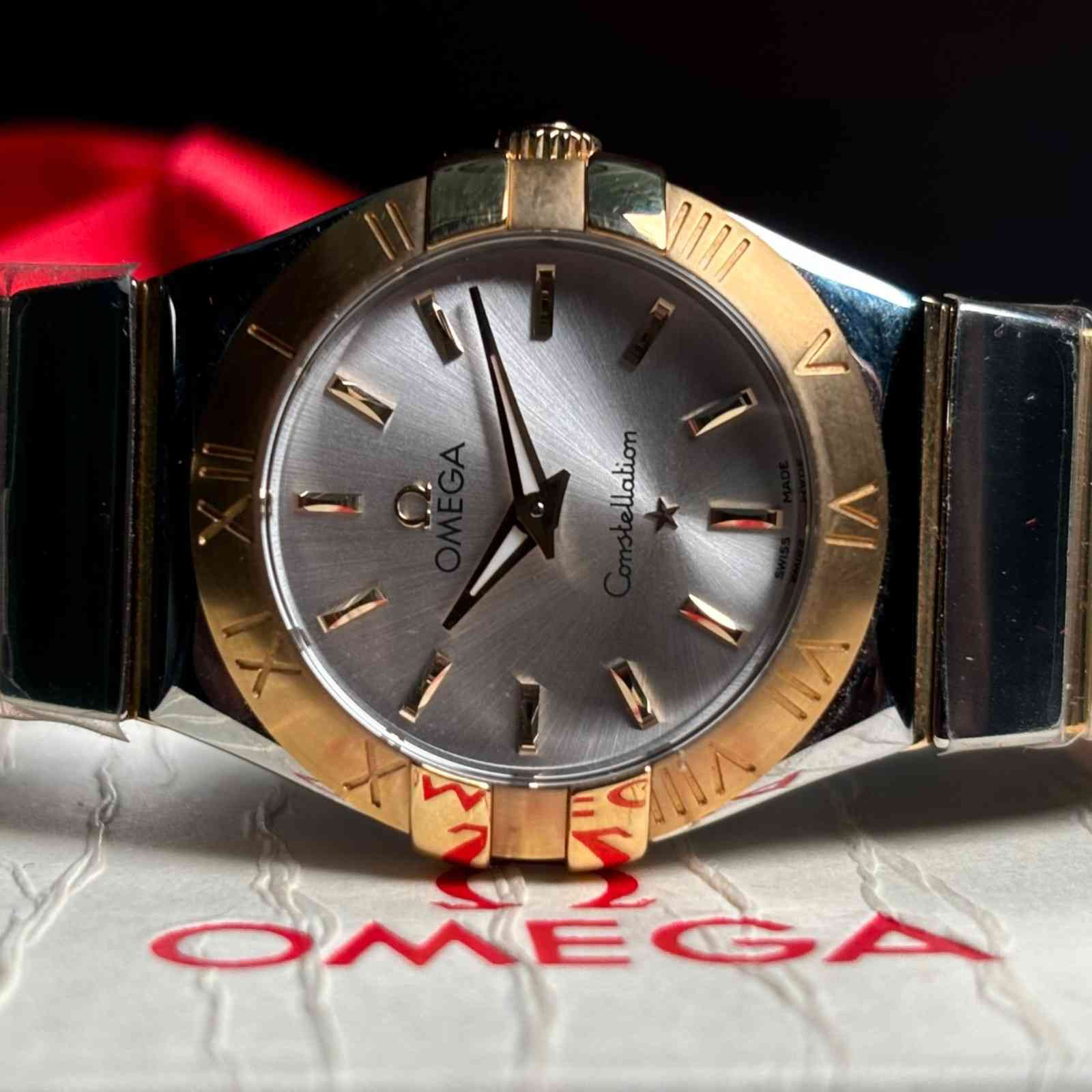 ساعت مچی زنانه امگا 27 میلیمتری تمام میخ طلا آکبند Omega Constellation مدل k-123.20.27.60.02.004-92172253 - تصویر 2