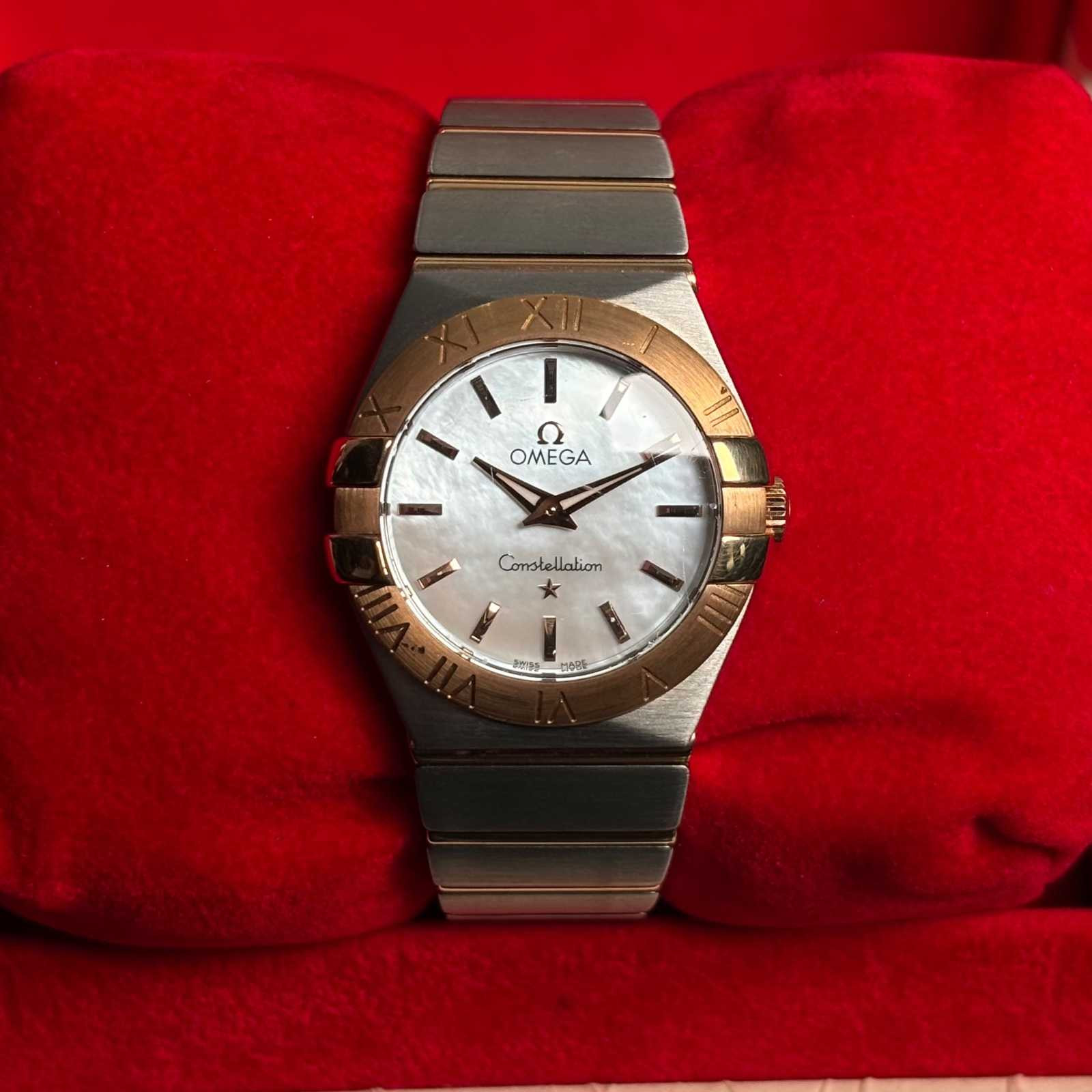 ساعت مچی زنانه امگا 27 میلیمتری تمام میخ طلا صفحه صدف Omega Constellation New Face مدل k-123.10.27.60.51.001-91824214